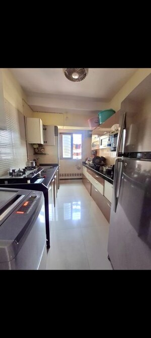 Kitchen in 2 BHK Apartment at Sudarshan Sky Garden, Ghodbunder Road – for Rent