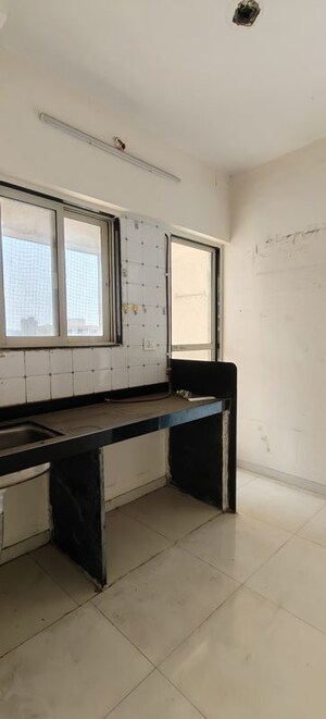 Kitchen in 1 BHK Apartment at Seven Apna Ghar Phase 2 Plot A, Mira Road – for Sale