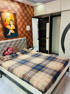 Bedroom in 2 BHK Apartment at Sheth Vasant Sagar Complex, Kandivali East – for Rent