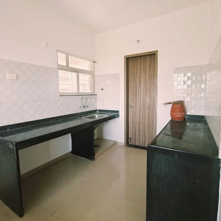 Kitchen, singad kondwa 2 Bedroom 820 Sq.Ft. Apartment In Singad Kondwa Pune 10325613