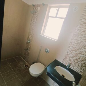 Bathroom in 2 BHK Apartment at Singad Kondwa – for Sale