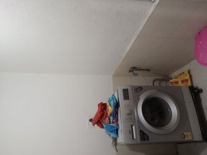 Laundry Area in 2 BHK Apartment at Singasandra – for Sale
