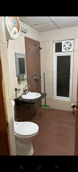 Bathroom in 2 BHK Apartment at Mahagun Moderne, Sector 78 – for Rent
