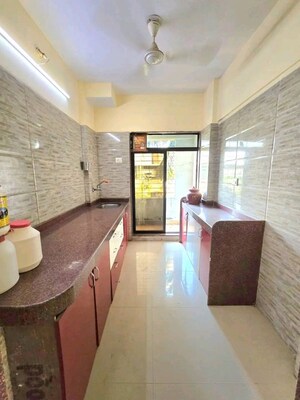 Kitchen in 2 BHK Apartment at Jeevdani Oakwood, Nalasopara West – for Rent