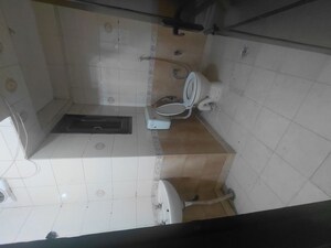 Bathroom in 2 BHK Apartment at Janakpuri – for Sale