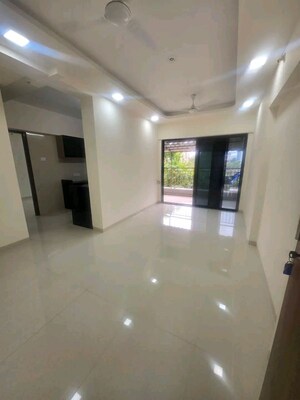 Hall in 2 BHK Apartment at Agarwal Krish Garden, Nalasopara West – for Rent