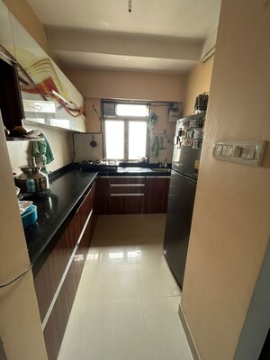 Kitchen in 1.5 BHK Apartment at Lodha Casa Royale, Balkum Pada – for Rent