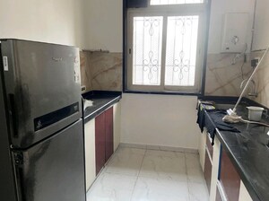 Kitchen in 2 BHK Apartment at Larkins Pride Palms, Kolshet Road – for Rent