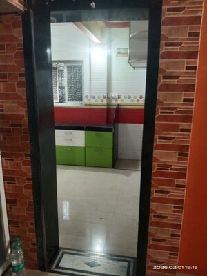 Kitchen in 1 BHK Apartment at Suryodaya Apartments, Seawoods Sector 48 – for Sale