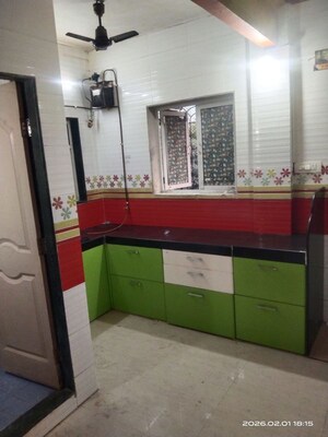 Kitchen in 1 BHK Apartment at Suryodaya Apartments, Seawoods Sector 48 – for Sale