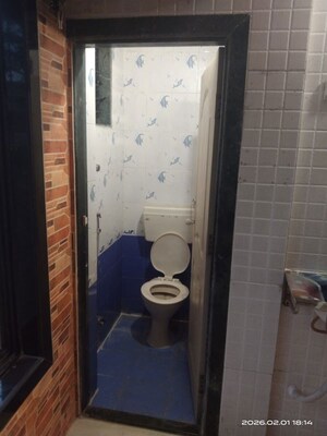 Bathroom in 1 BHK Apartment at Suryodaya Apartments, Seawoods Sector 48 – for Sale