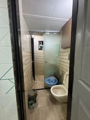 Bathroom in 1 BHK Apartment at Seawoods – for Sale