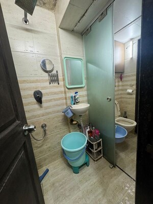 Bathroom in 1 BHK Apartment at Seawoods – for Sale
