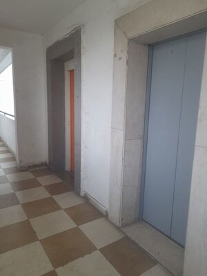 Building Lobby in 1 BHK Apartment at Aditya Celebrity Homes, Sector 76 – for Rent