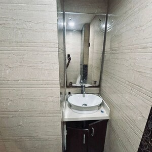 Bathroom in 4 BHK Apartment at Mayur Vihar – for Sale