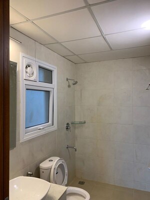 Bathroom in 3 BHK Apartment at Bhartiya Nikoo Homes, Thanisandra Main Road – for Rent
