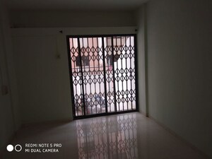 Room in 2 BHK Apartment at Vijay Nagar CHS, Dhayari – for Rent