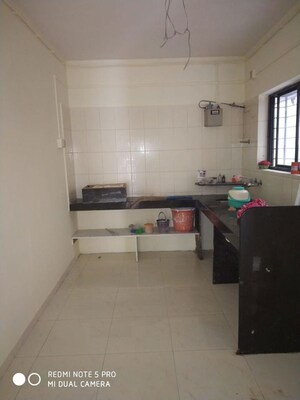 Kitchen in 2 BHK Apartment at Vijay Nagar CHS, Dhayari – for Rent