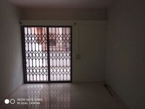 Room in 2 BHK Apartment at Vijay Nagar CHS, Dhayari – for Rent