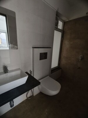 Bathroom in 1 BHK Apartment at Omkar Signet, Malad East – for Rent