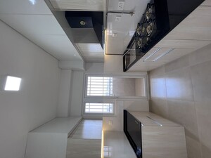 Kitchen in 3 BHK Apartment at Bhartiya Nikoo Homes Phase 2, Thanisandra Main Road – for Rent