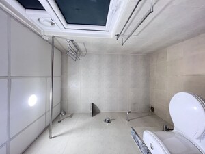 Bathroom in 3 BHK Apartment at Bhartiya Nikoo Homes Phase 2, Thanisandra Main Road – for Rent