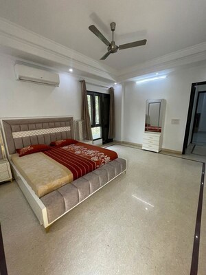 Bedroom in 4 BHK Builder Floor at Chittaranjan Park – for Rent