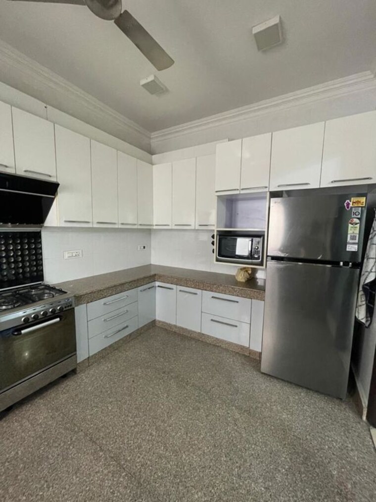 Kitchen, chittaranjan park 4 Bedroom 3000 Sq.Ft. Builder Floor In Chittaranjan Park Delhi 10326404