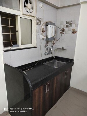 Kitchen in 2 BHK Apartment at Aswani Green Valley, Wakad – for Sale