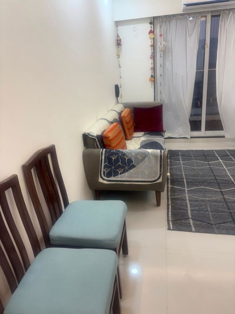 Living Room, lokhandwala-infrastructure-lady-ratan-tower 1 Bedroom 1000 Sq.Ft. Apartment In Worli Mumbai 10326566