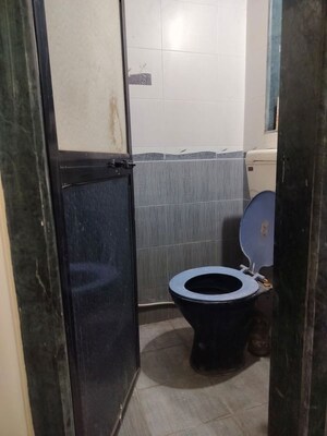 Bathroom in 1 BHK Apartment at Raj Park CHS, Kalwa – for Rent