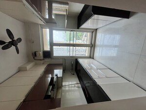 Kitchen in 2 BHK Apartment at Vijay Galaxy, Waghbil – for Sale