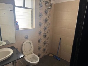 Bathroom in 2 BHK Apartment at Kolte Patil Langston, Kharadi – for Rent