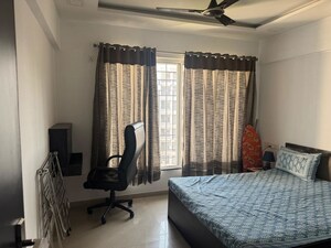 Living Room in 2 BHK Apartment at Kolte Patil Langston, Kharadi – for Rent