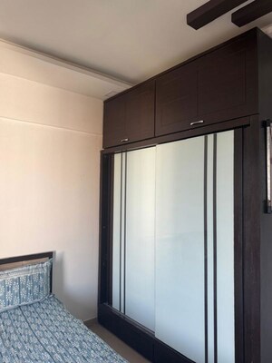 Bedroom in 2 BHK Apartment at Kolte Patil Langston, Kharadi – for Rent