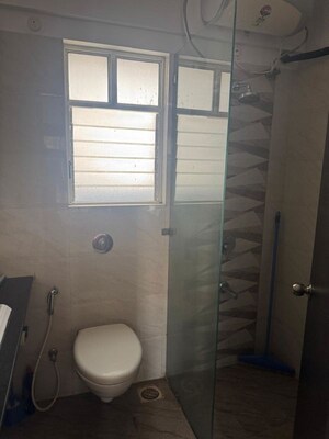 Bathroom in 2 BHK Apartment at Kolte Patil Langston, Kharadi – for Rent