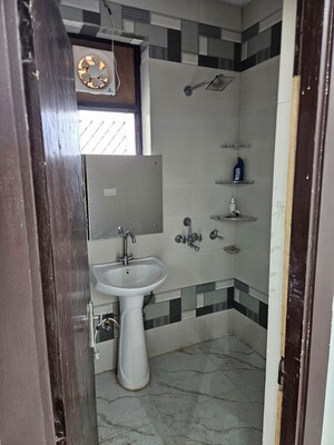 Bathroom in 3 BHK Builder Floor at Green Fields Colony – for Rent