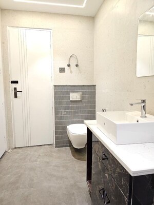 Bathroom in 4 BHK Builder Floor at Green Fields Colony – for Rent