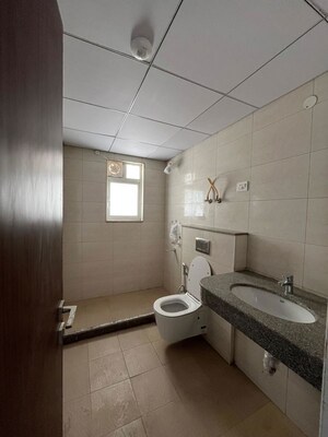 Bathroom in 3 BHK Apartment at Godrej Meridien, Sector 106 – for Sale