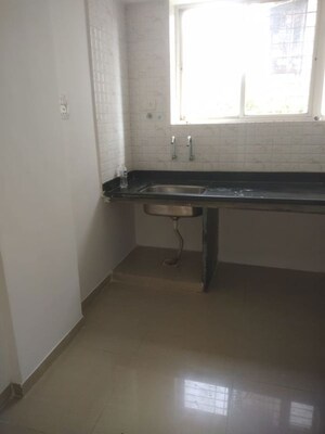 Kitchen in 1 RK Apartment at Legacy Sannidhi, Dighi – for Sale