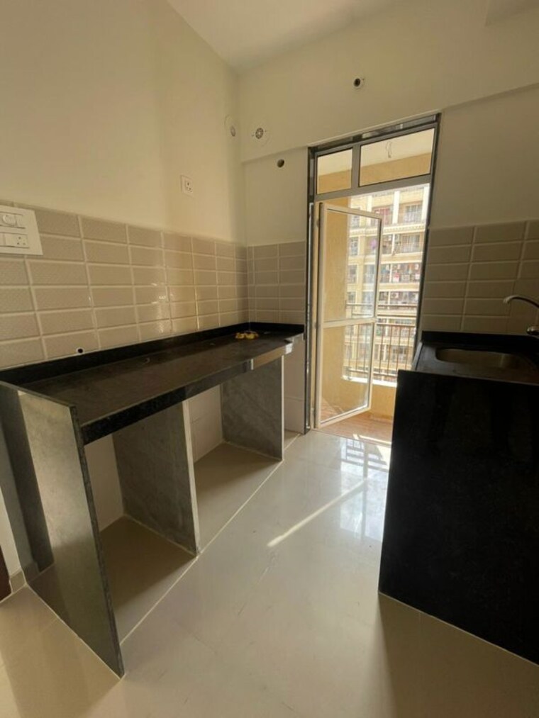 Kitchen, jp-north-aviva 1 Bedroom 360 Sq.Ft. Apartment In Mira Road Thane 10327143