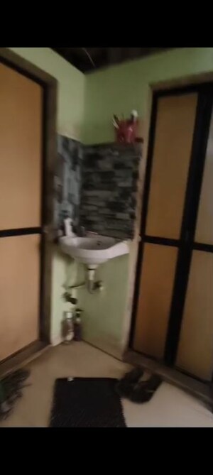 Bathroom in 1 BHK Apartment at Tilak Nagar – for Rent