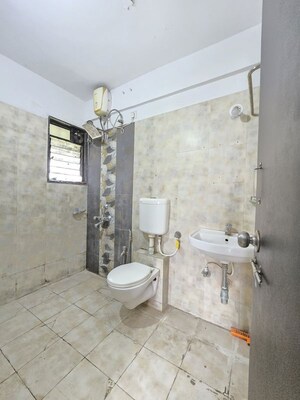 Bathroom in 2 BHK Apartment at Wadgaon Sheri – for Sale