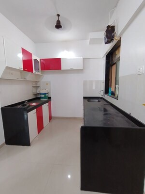 Kitchen in 2 BHK Apartment at Shree Satya Shankar Residency, Manpada – for Sale