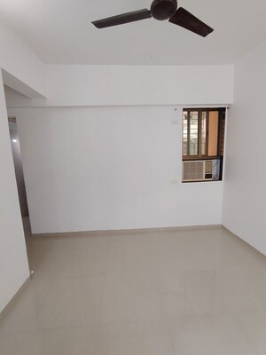 Room in 2 BHK Apartment at Shree Satya Shankar Residency, Manpada – for Sale
