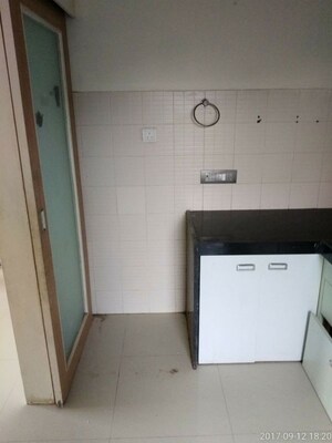 Kitchen in 1 BHK Apartment at Rosa Gardenia, Ghodbunder Road – for Rent