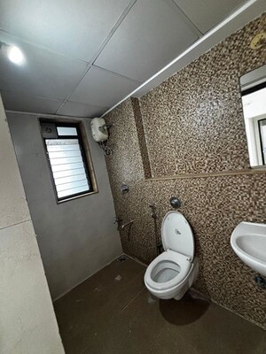 Bathroom in 2 BHK Apartment at Lodha Lakeshore Greens, Dombivli East – for Rent