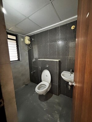 Bathroom in 2 BHK Apartment at Lodha Lakeshore Greens, Dombivli East – for Rent