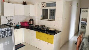 Kitchen in 2 BHK Apartment at Sonigara Omega Paradise, Wakad – for Rent