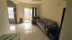 Living Room in 2 BHK Apartment at Sonigara Omega Paradise, Wakad – for Rent